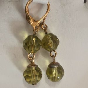 Green crystal earrings.